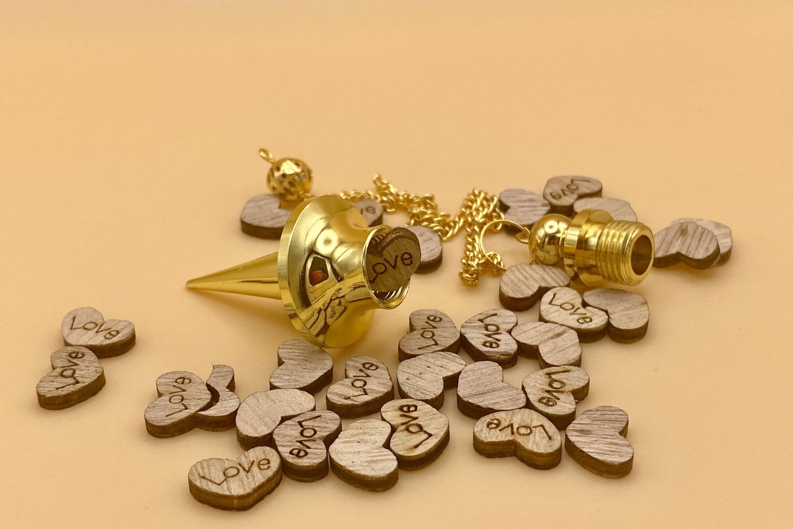 pendulo metal con testigo