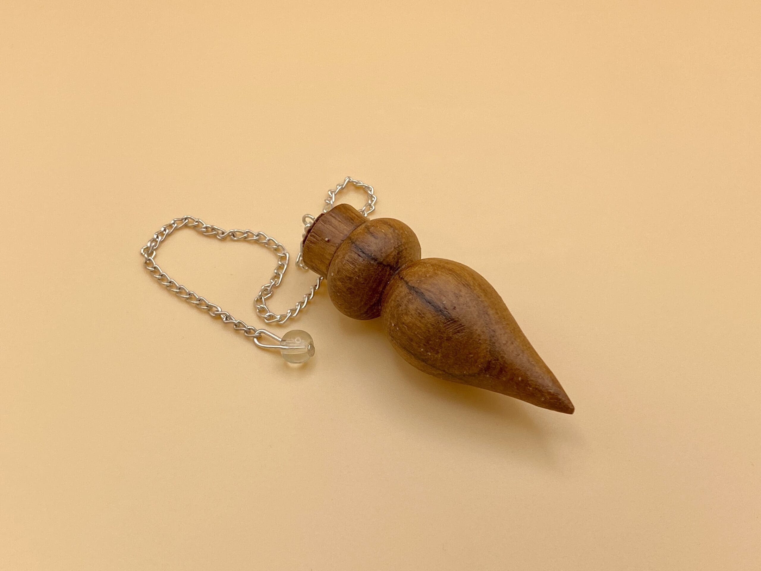 Péndulo de madera natural