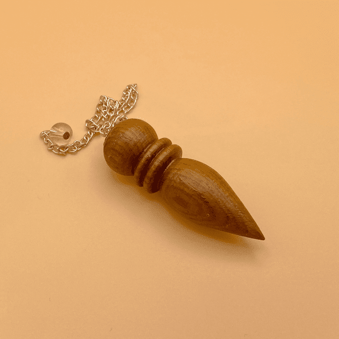 pendulo egipcio de madera natural con dos baterías (1).jpg