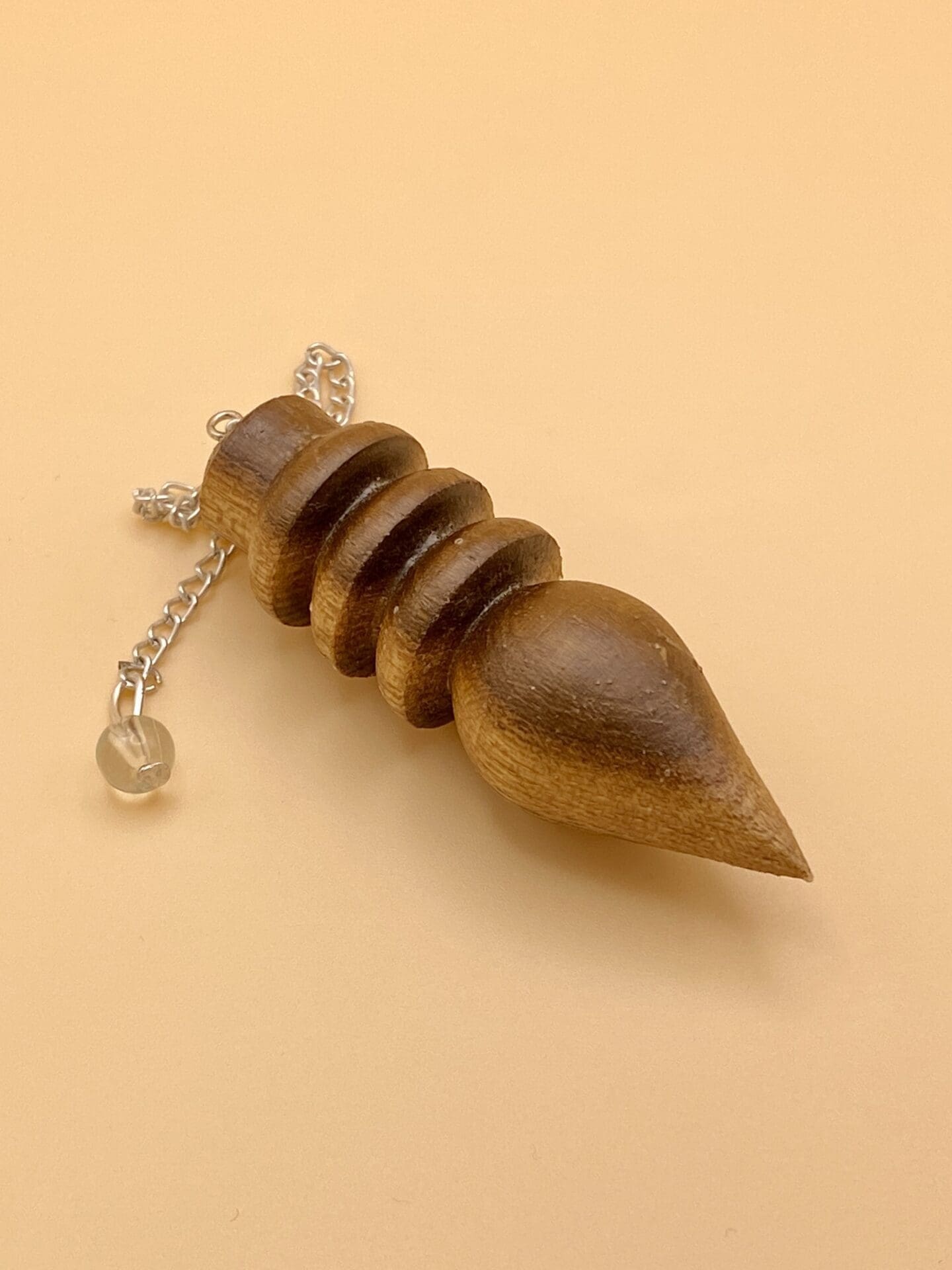 Péndulo Karnak de madera natural de tres anillos