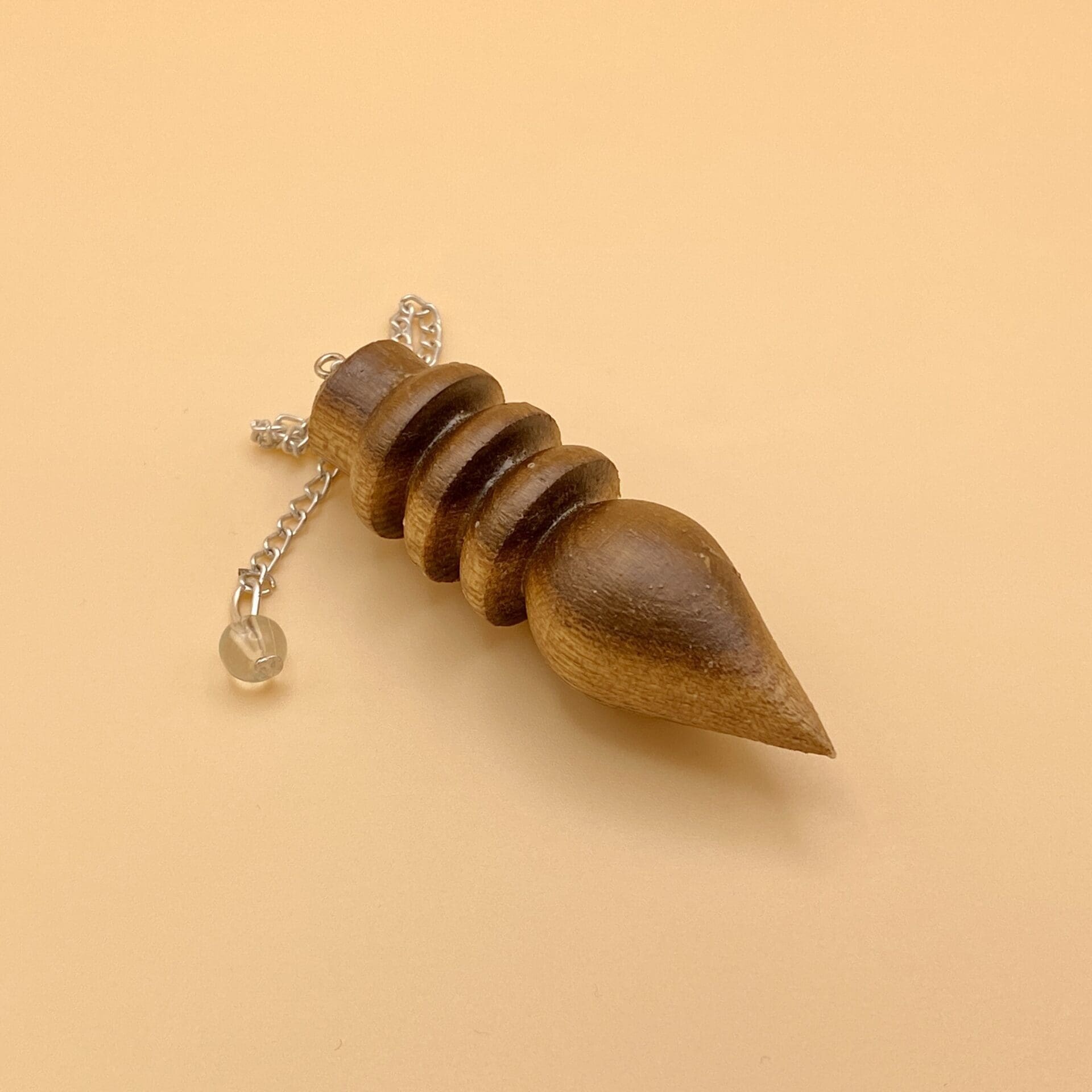 Péndulo Karnak de madera natural de tres anillos