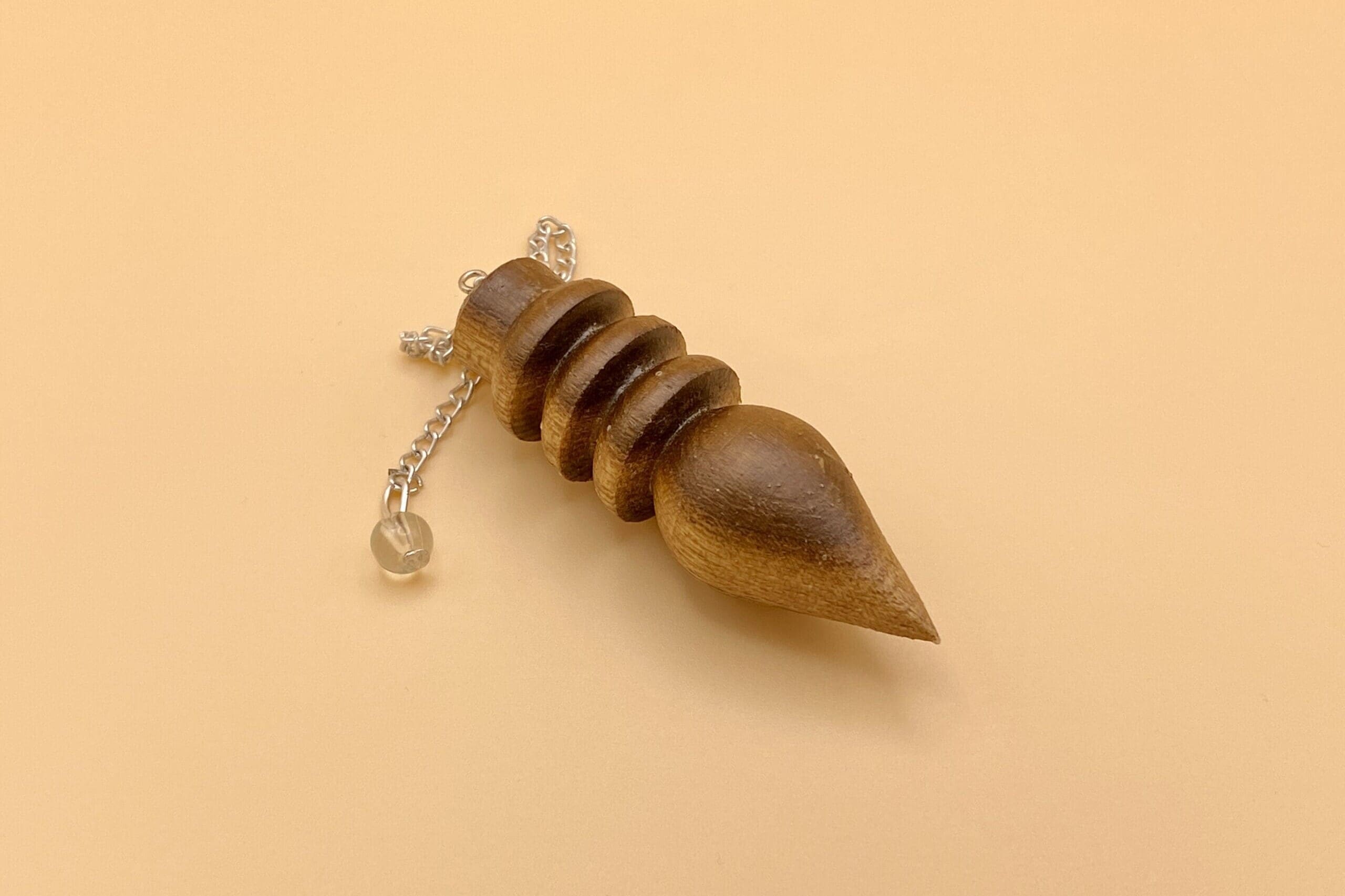 Péndulo Karnak de madera natural de tres anillos