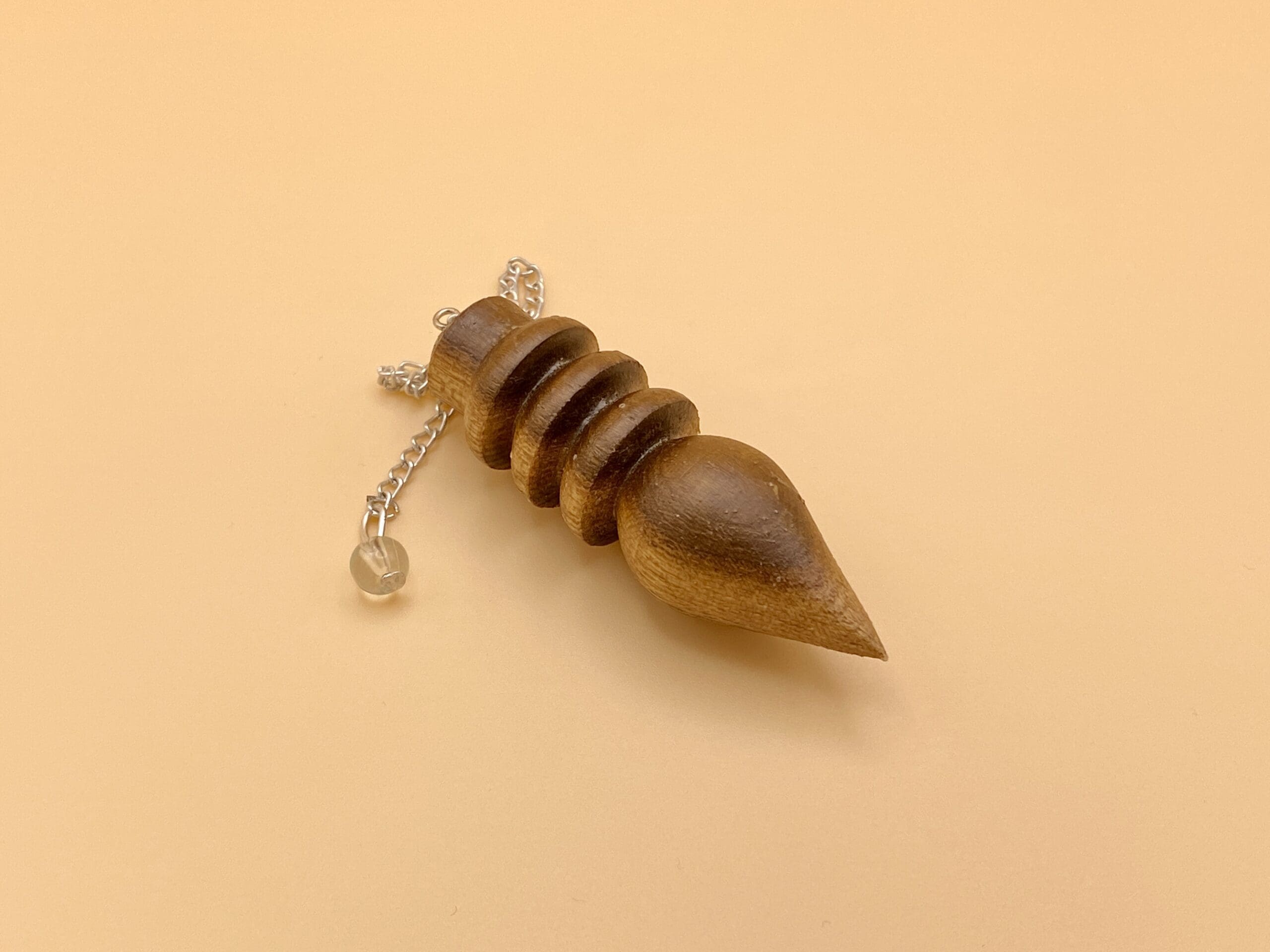 Péndulo Karnak de madera natural de tres anillos