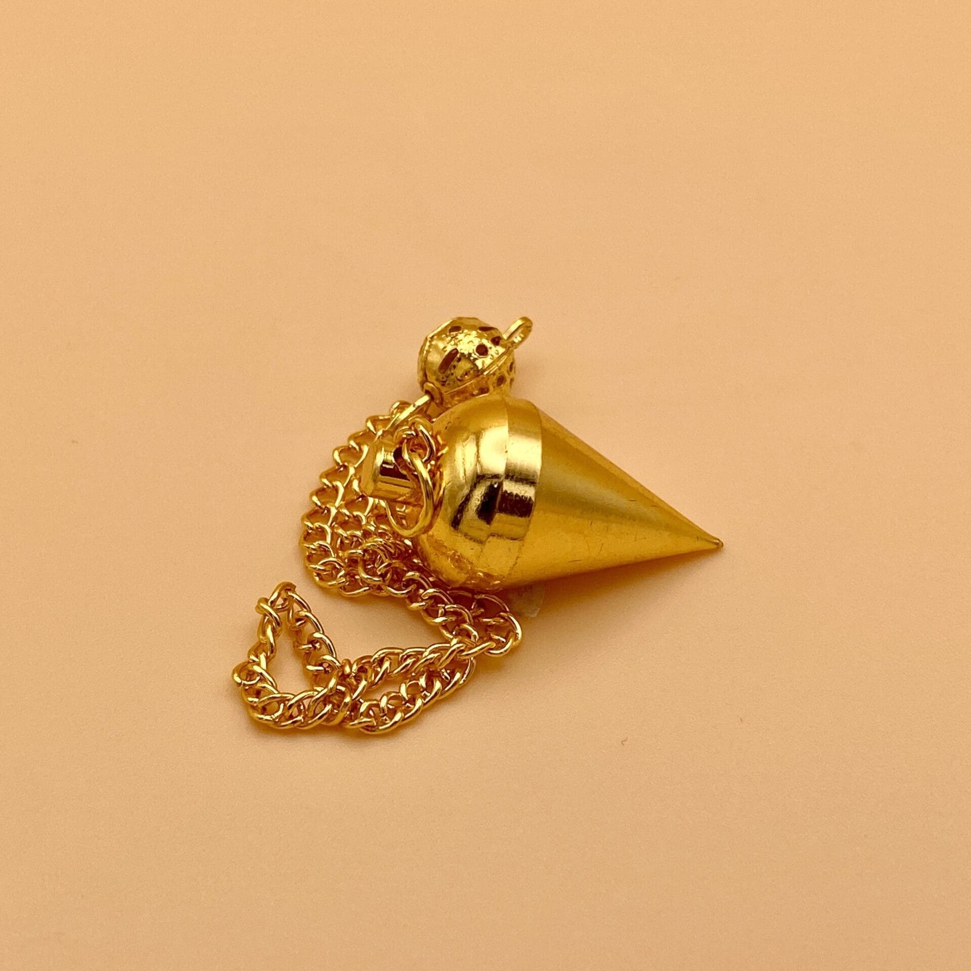 Péndulo mimosa metal dorado