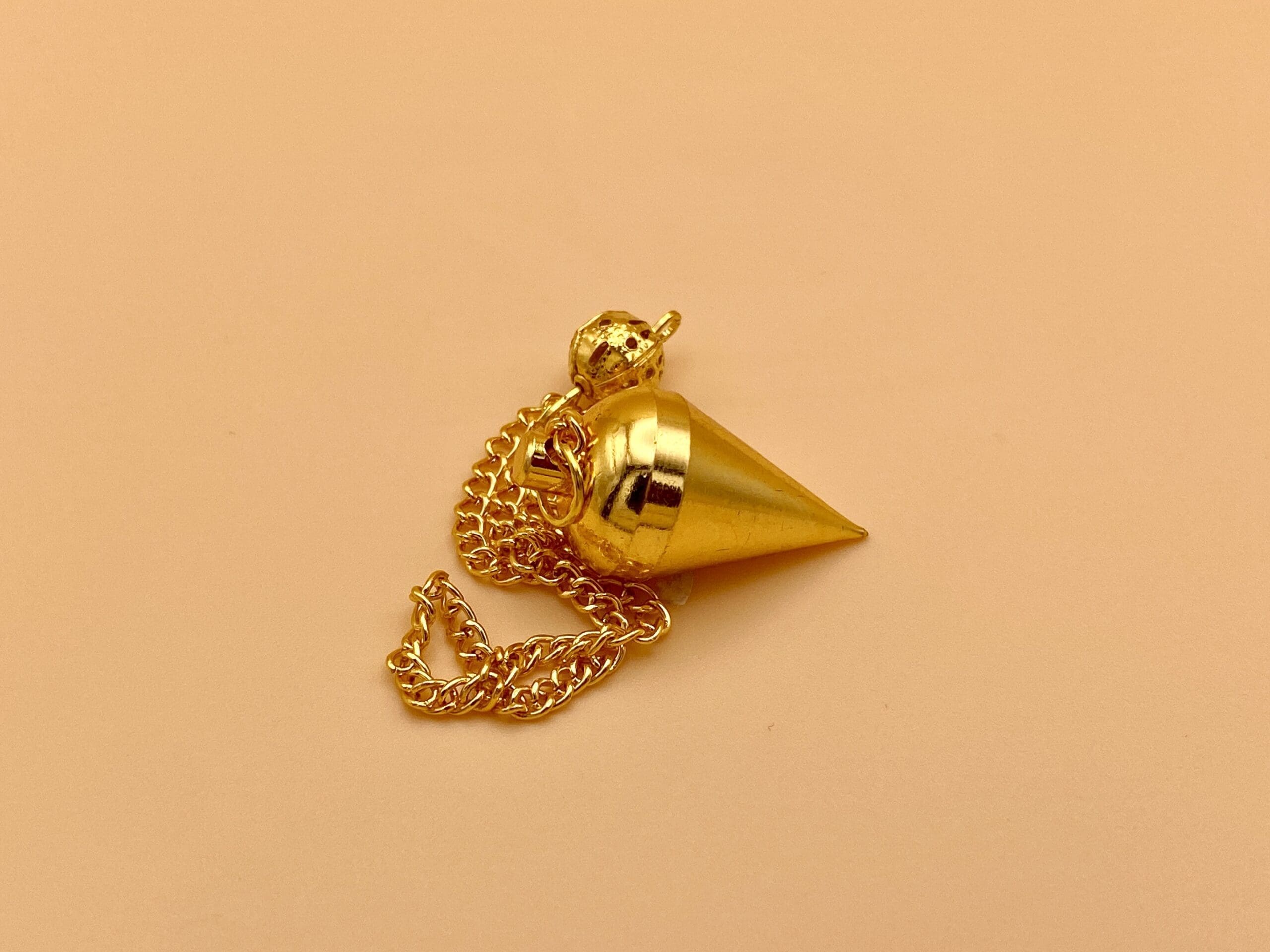 Péndulo mimosa metal dorado
